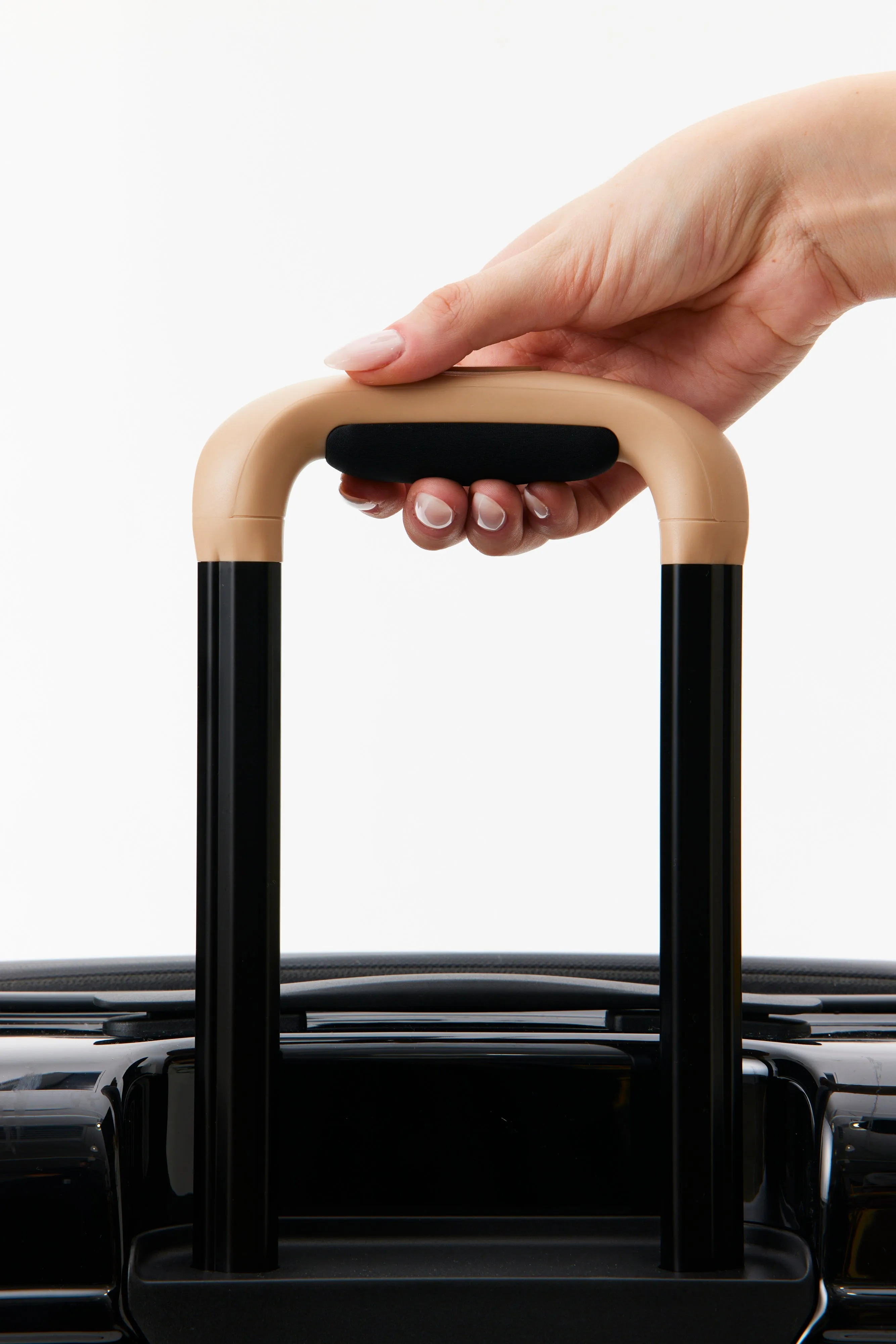 The Carry-On Roller in Glossy Black