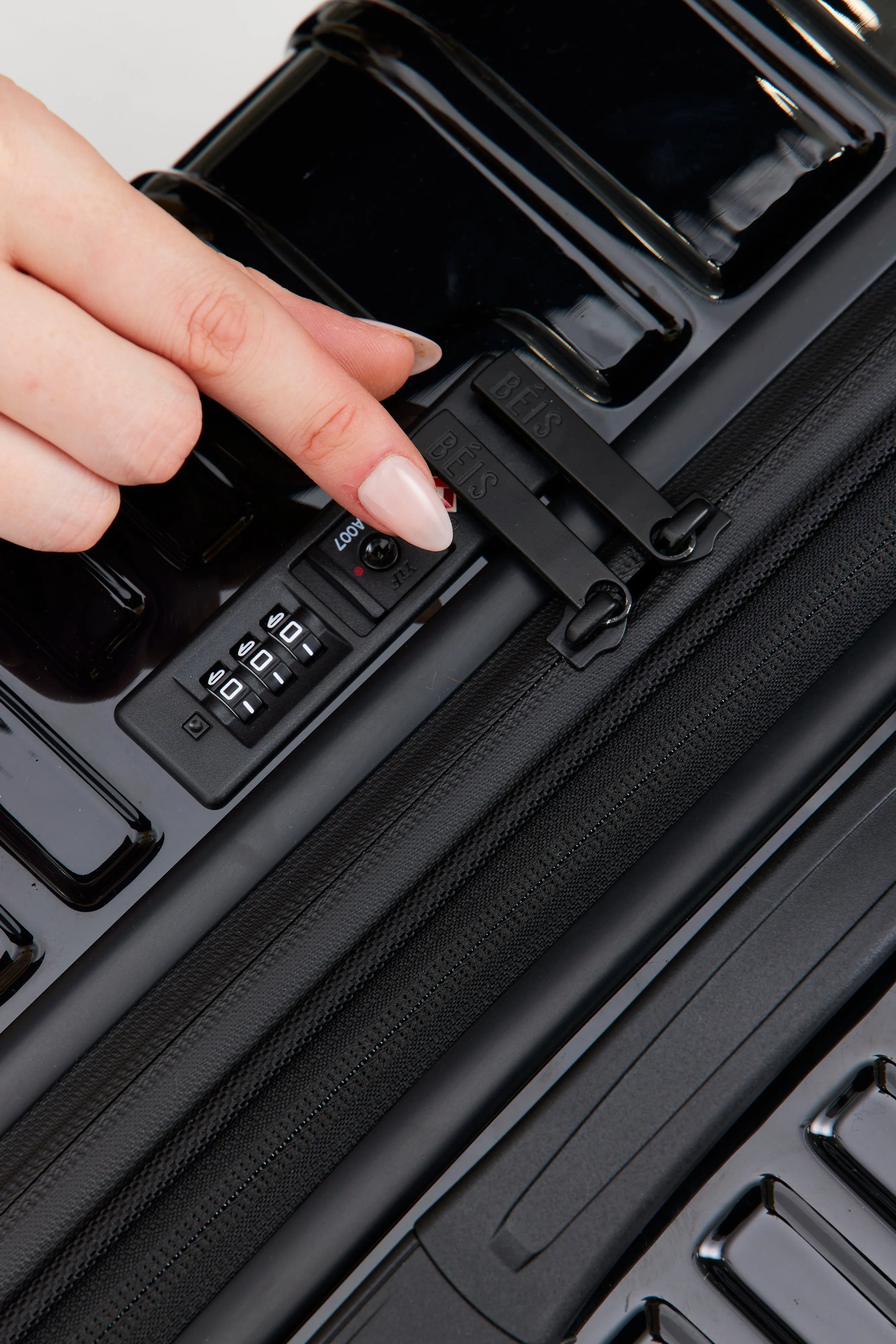 The Carry-On Roller in Glossy Black